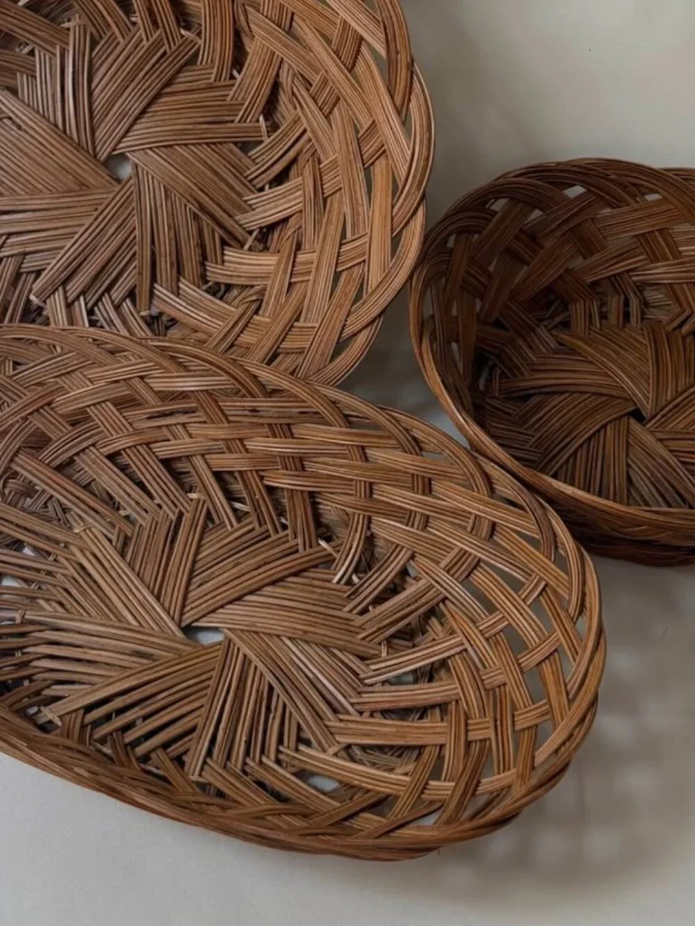 Set of Three 1970s Hand-Woven Rattan Baskets
